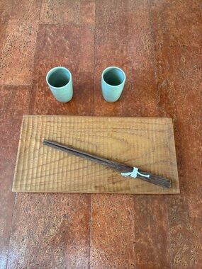 New never used Sushi set with sake cups and four chopsticks.